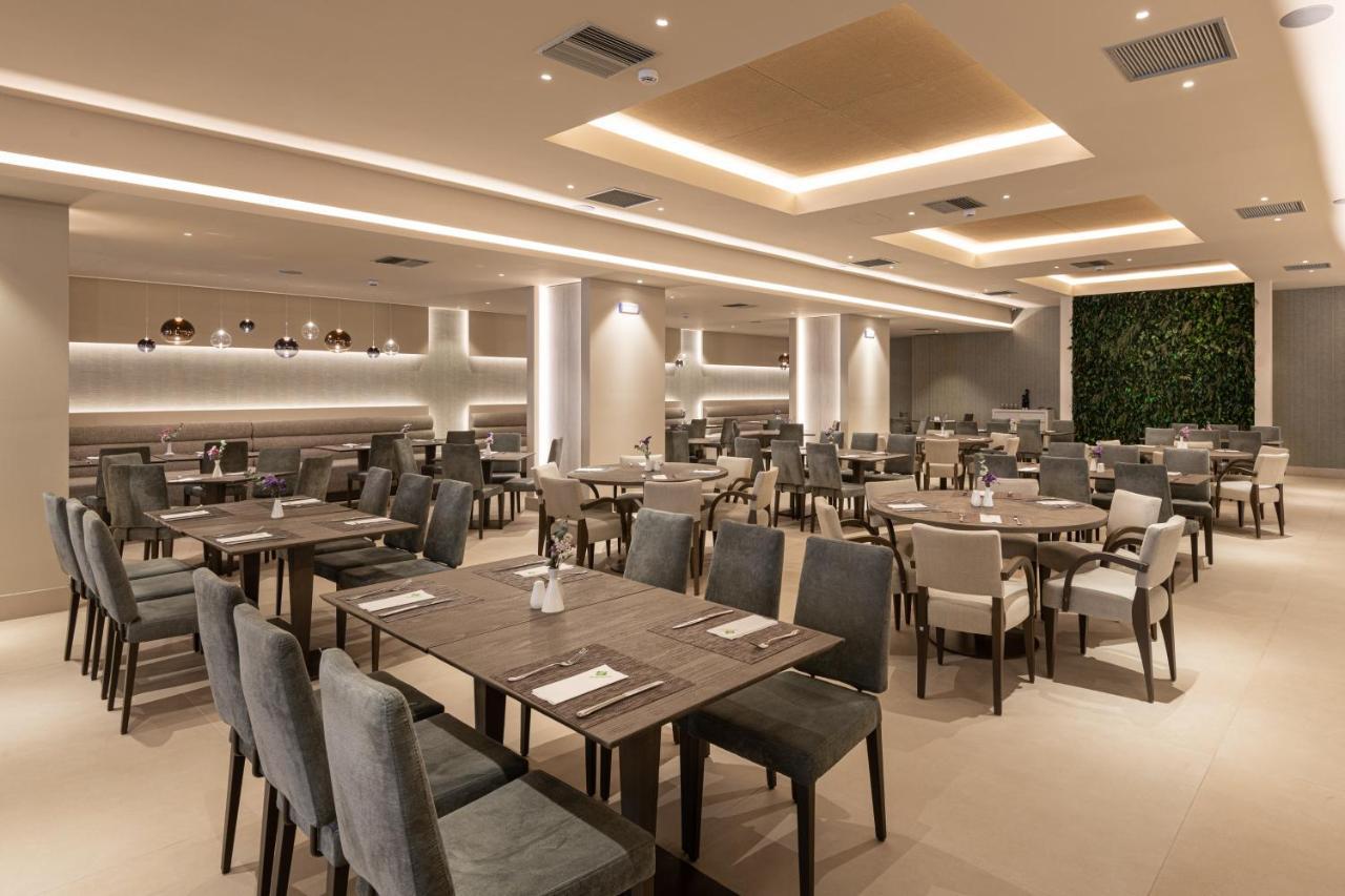 塞萨洛尼基假日酒店 外观 照片 The interior of the restaurant